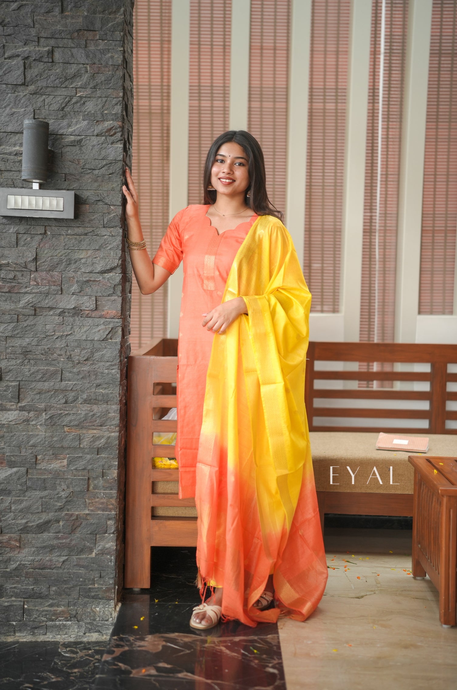 Arisi & azhagu - a yellow orange silk suit