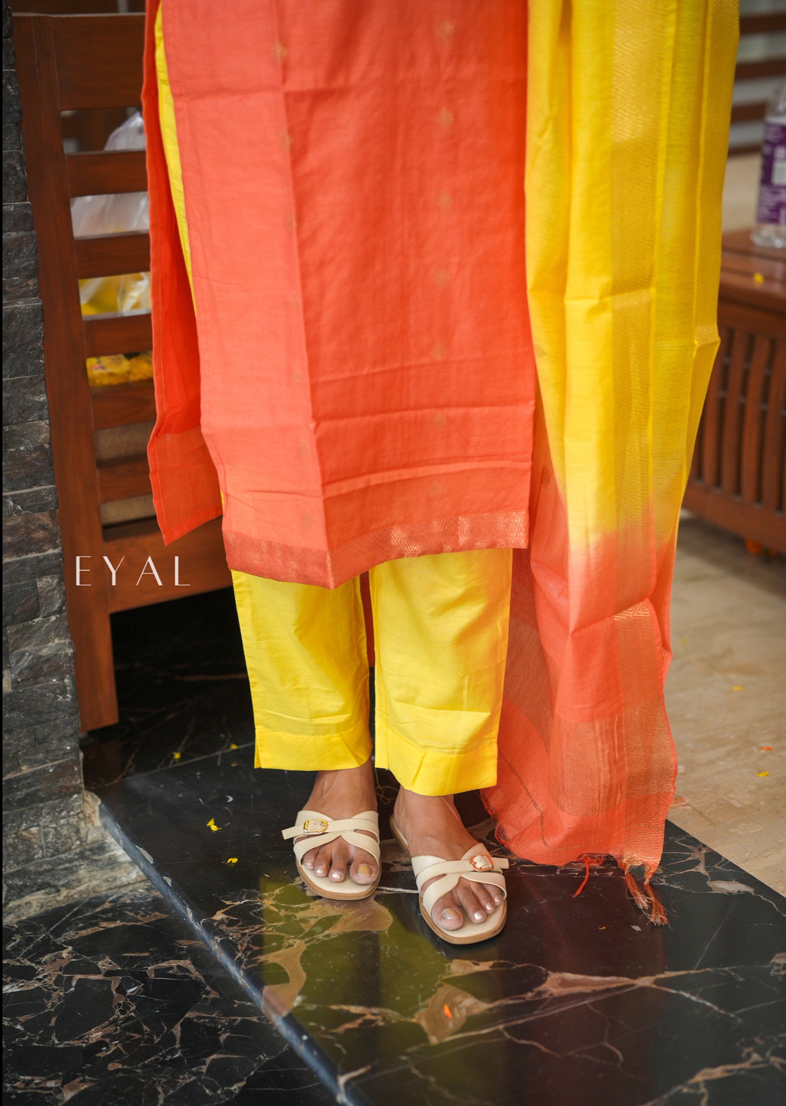 Arisi & azhagu - a yellow orange silk suit