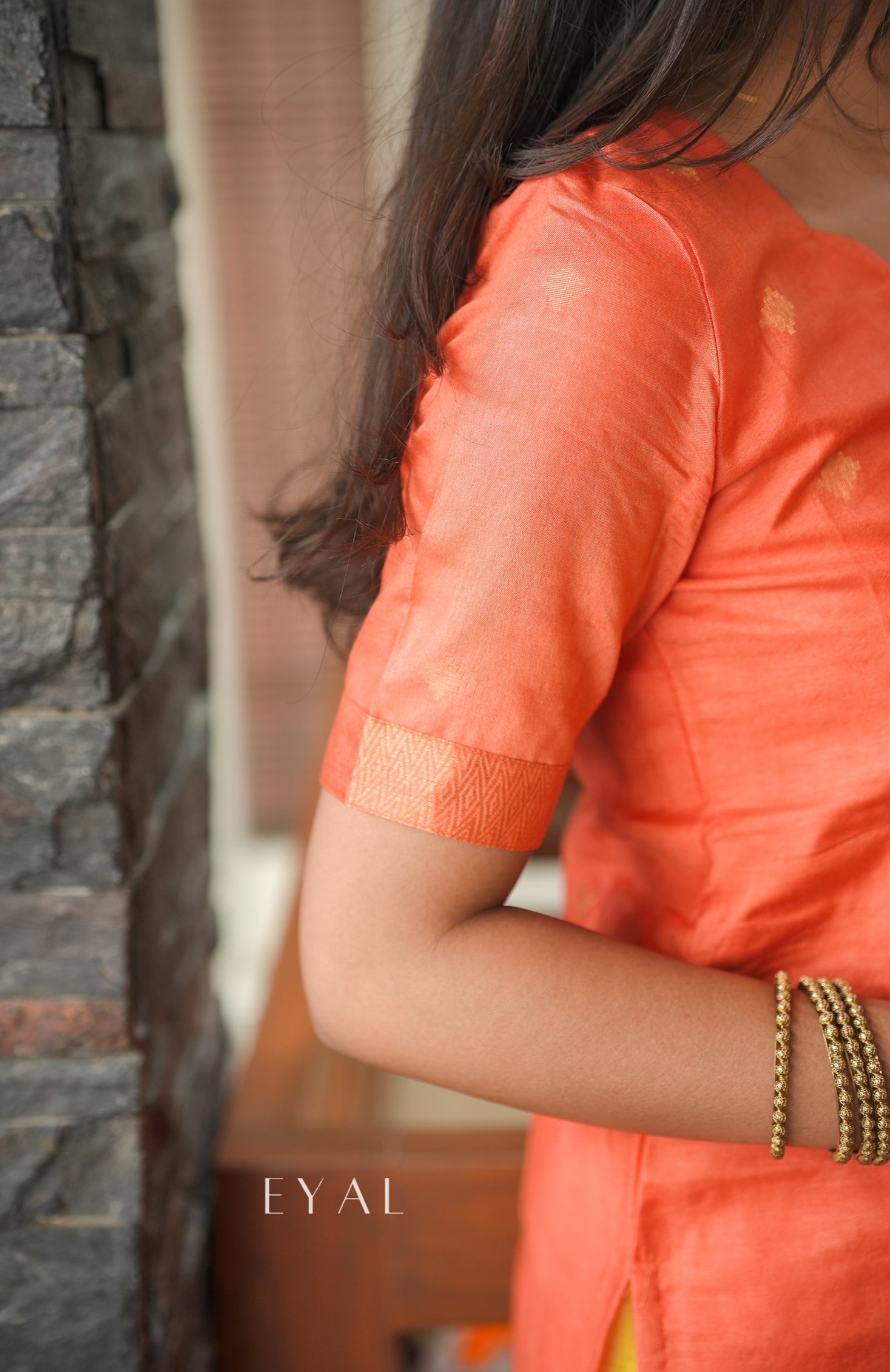 Arisi & azhagu - a yellow orange silk suit